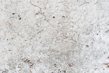 Wall fragment with scratches and cracks