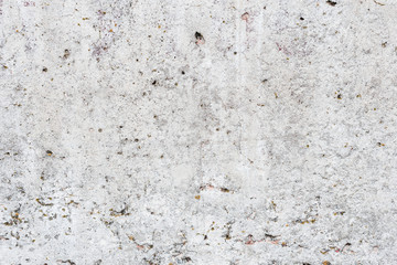 Wall fragment with scratches and cracks