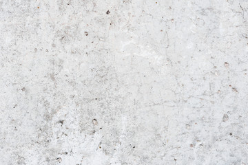 Fototapeta premium Wall fragment with scratches and cracks