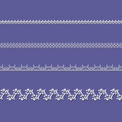 set of white lace ribbons