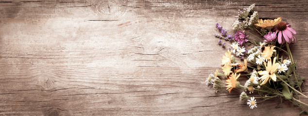 Bouquet of wild flowers vintage board