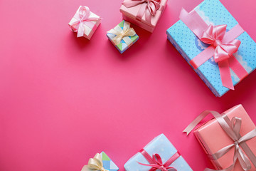 Beautiful gifts on color background