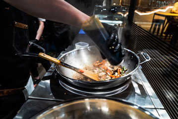 chef making wok box