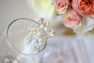 close up with beautiful wedding earrings