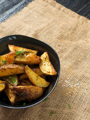 Country potatoes with dill and spices copy space