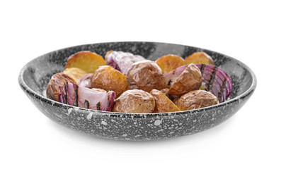 Plate with tasty baked potato on white background