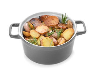 Pot with tasty baked potato on white background