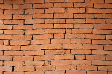 Stack of red brick for construction.