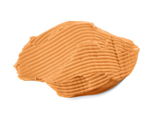 Tasty peanut butter on white background
