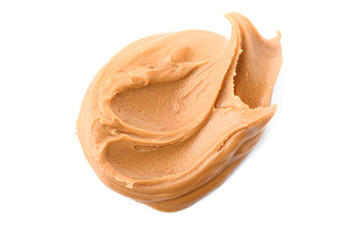 Tasty peanut butter on white background