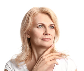 Portrait of beautiful mature woman on white background