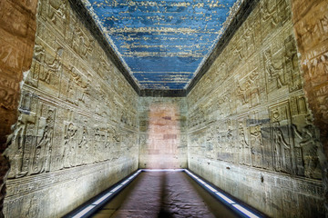 Dendera temple or Temple of Hathor Egypt. Corridor with relief images based on the mythology of...
