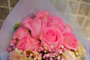 Macro view of colorful blue white yellow pink orange green purple rose flower bouquet in full blossom