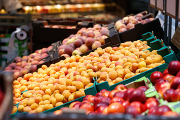 Unpacked, fresh fruits in a self-service supermarket.