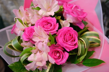 Macro view of colorful blue white yellow pink orange green purple rose flower bouquet in full blossom