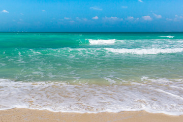 Soft Blue Ocean Wave On Sandy Beach. Background.