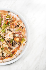 Bacon and green pepper traditional pizza