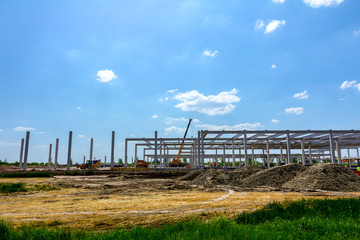 Fototapeta premium View on building site, unfinished concrete edifice