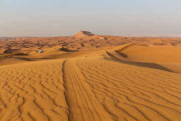 Fototapeta na wymiar Huge dunes of the desert. Fine place for photographers and travelers.