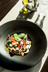 Fresh salad served on restaurant table