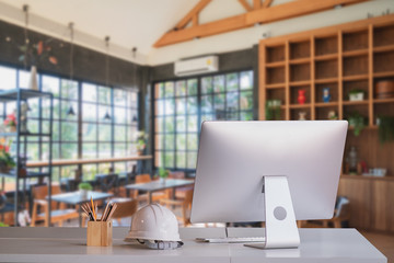 Stylish workspace with desktop computer, office supplies at office. desk work concept.	