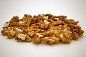 Walnut Kernels (Other Names: Juglans Regia, Persian Walnut, English Walnut, Circassian Walnut). Isolated Image On A White Background