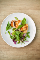 grilled chicken breast and salad