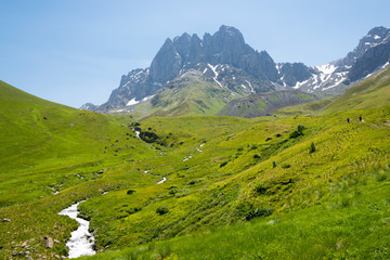 Obraz premium Kazbegi, Georgia - Jul 03 2018: Juta valley near Caucasus mountain. a famous landscape in Kazbegi, Mtskheta-Mtianeti, Georgia.