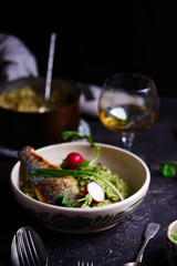 risotto with wild garlic and sea bass.style rustic.