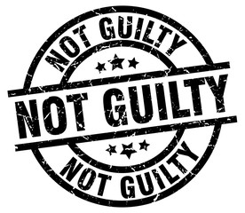 not guilty round grunge black stamp