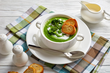 broccoli cream soup with mint, top view