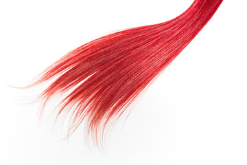 Piece of beautiful, shiny, red hair on white isolated background.  Modern hair color ideas