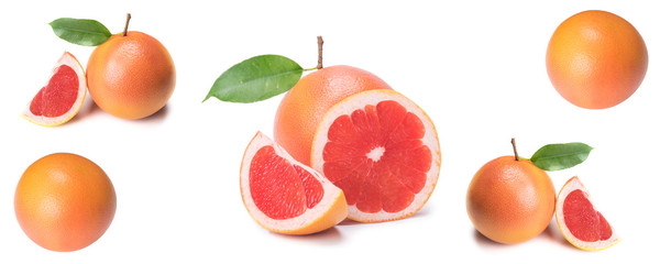 Isolated citrus, fresh pink grapefruit whole and slices, on white background, close-up