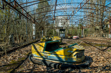 Old abandoned attraction in the city of Pripyat, Ukraine. The consequences of a nuclear explosion at the Chernobyl nuclear power plant. Ghost town