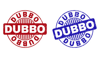 Grunge DUBBO round stamp seals isolated on a white background. Round seals with grunge texture in red and blue colors. Vector rubber watermark of DUBBO tag inside circle form with stripes.