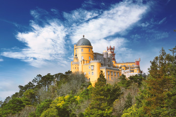 Pena Palace on a hill in the city of Sintra in Portugal on a bright spring day