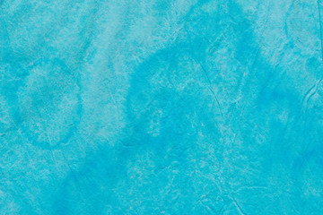 blue watercolor pastel painted on paper background texture