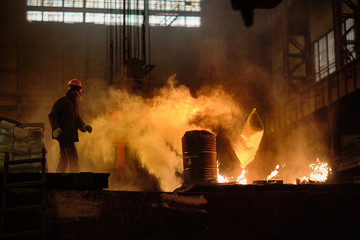 Metallurgists at casting ingots in Foundry Shop, Metallurgical production