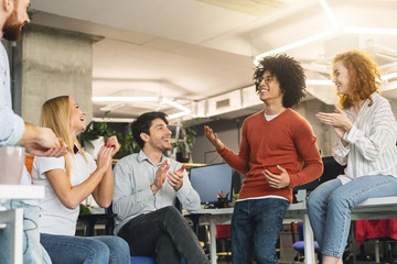 Creative team enjoying communication in modern office