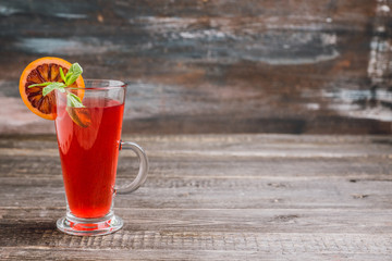 Fruit drink based on raspberry with red orange slice. Selective focus. Shallow depth of field.