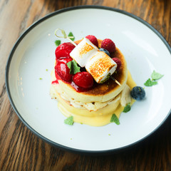 Pancakes with berries and marshmallow