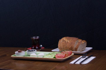 at breakfast, cucumber tomato cheese olive tray