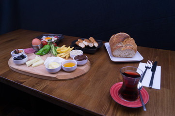 at breakfast, cucumber tomato cheese olive tray