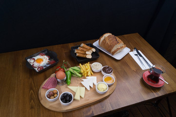 at breakfast, cucumber tomato cheese olive tray