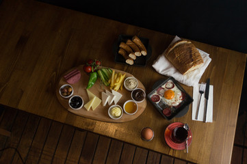at breakfast, cucumber tomato cheese olive tray