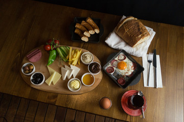 at breakfast, cucumber tomato cheese olive tray