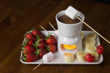 Prepared fruit and exotic chocolate service banana