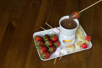 Prepared fruit and exotic chocolate service banana