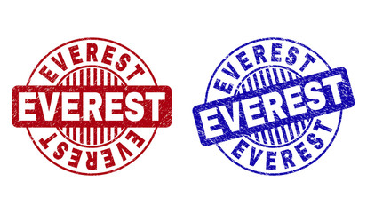 Grunge EVEREST round stamp seals isolated on a white background. Round seals with grunge texture in red and blue colors. Vector rubber imprint of EVEREST text inside circle form with stripes.