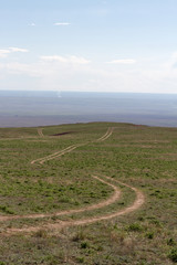 Kazakhstan steppe with rolling dirt roads